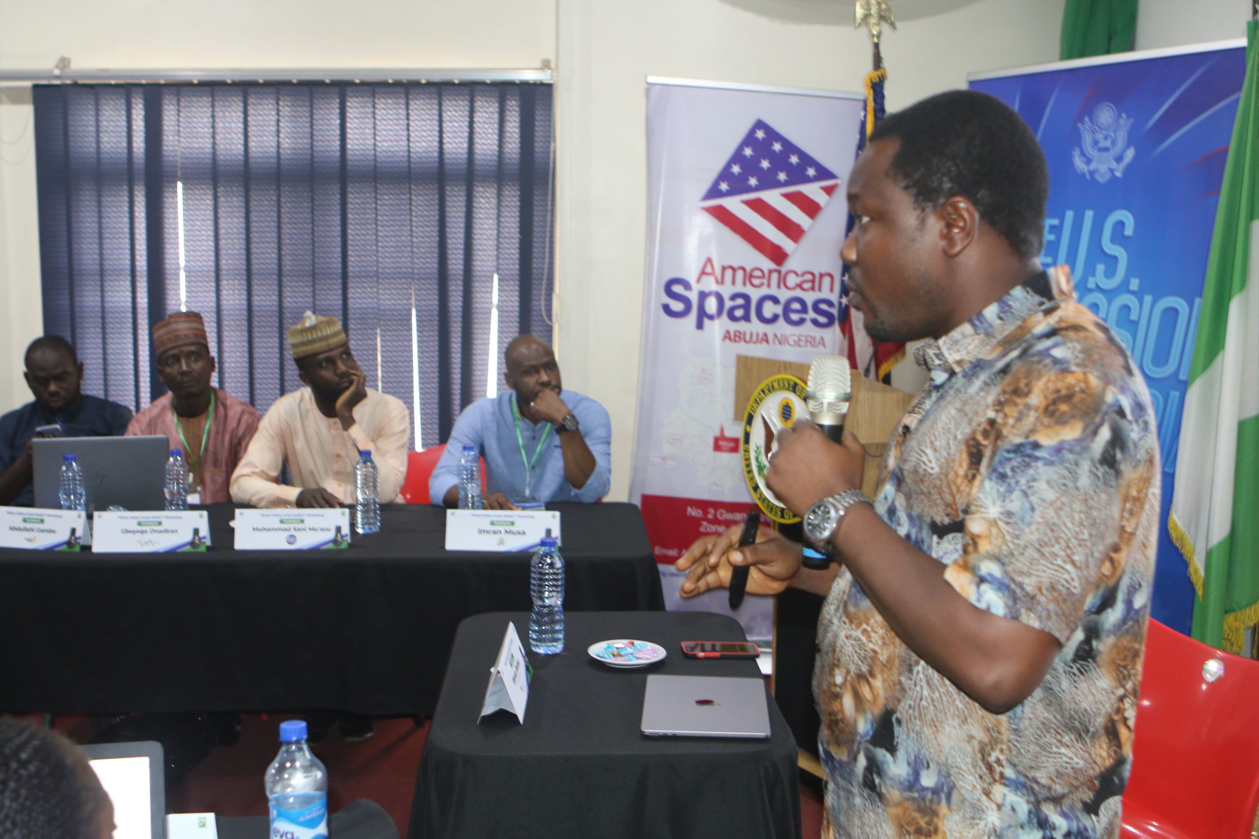 Samson Ademola leading a session during a training.